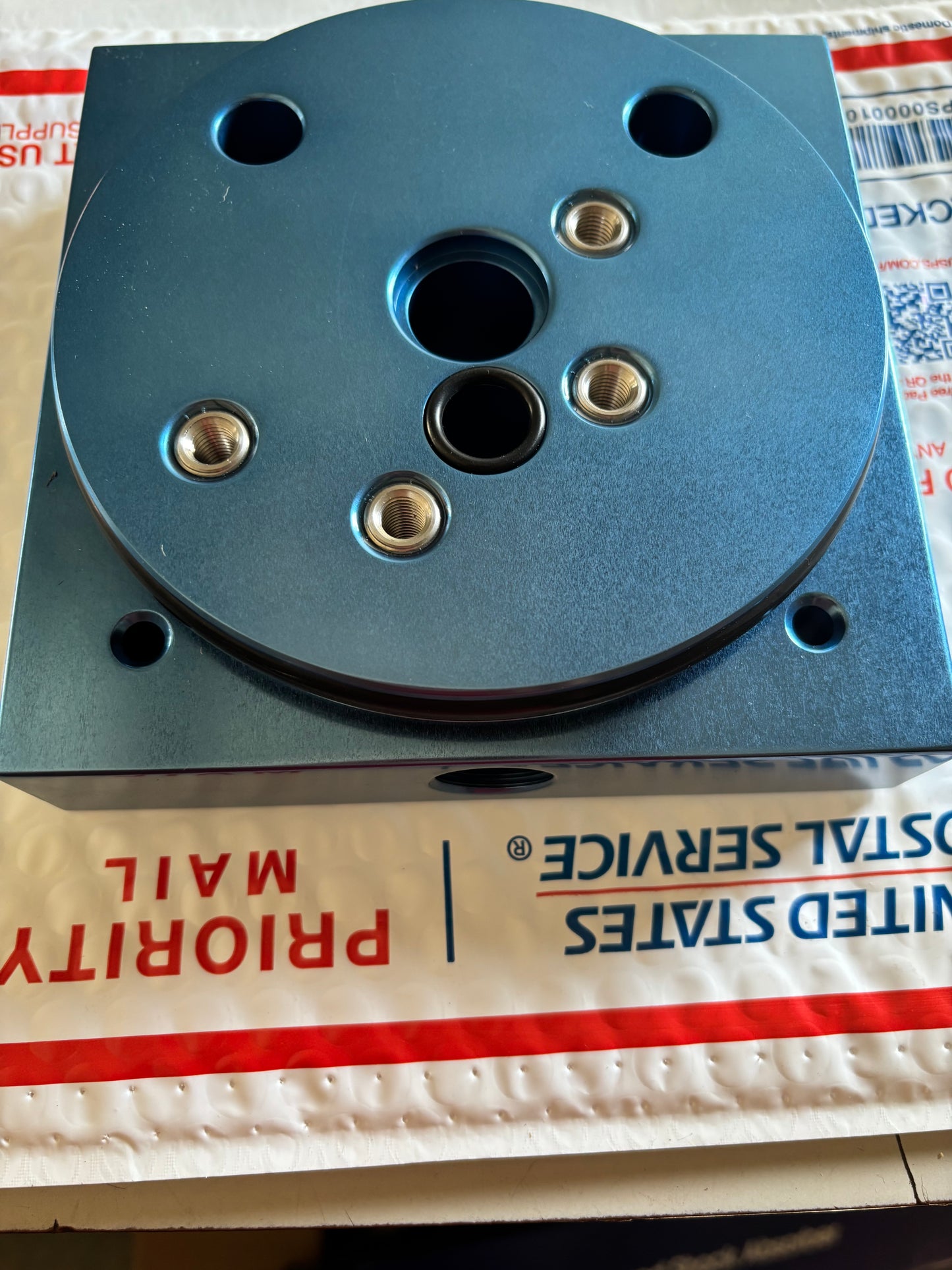 Blue anodized 1/2 center port block