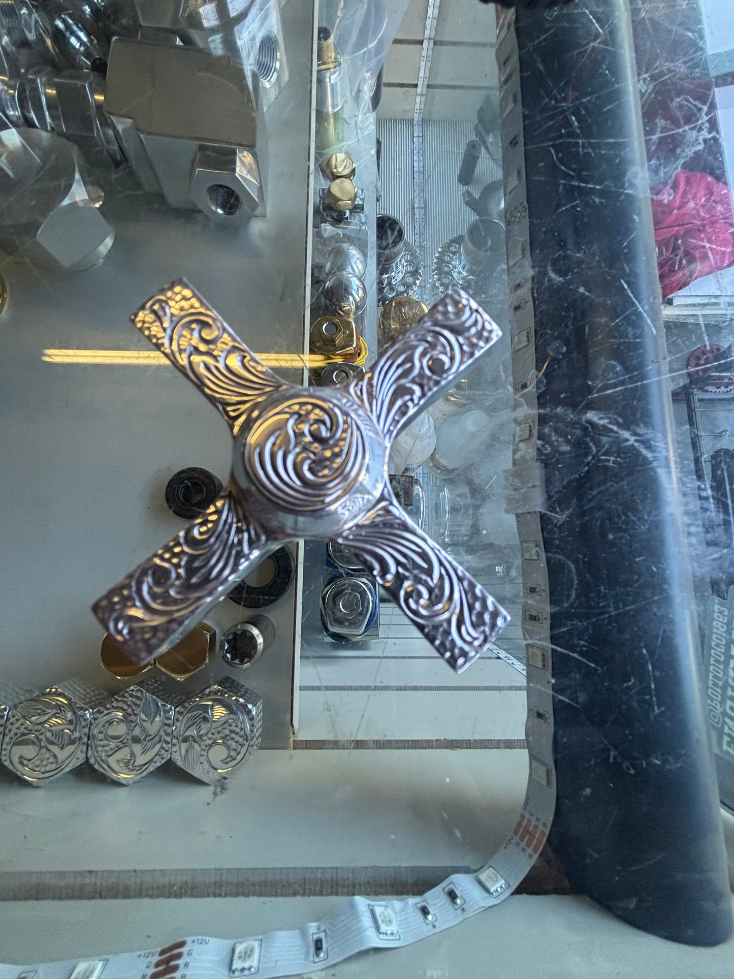 Engrave faucet style hydraulic tank plug